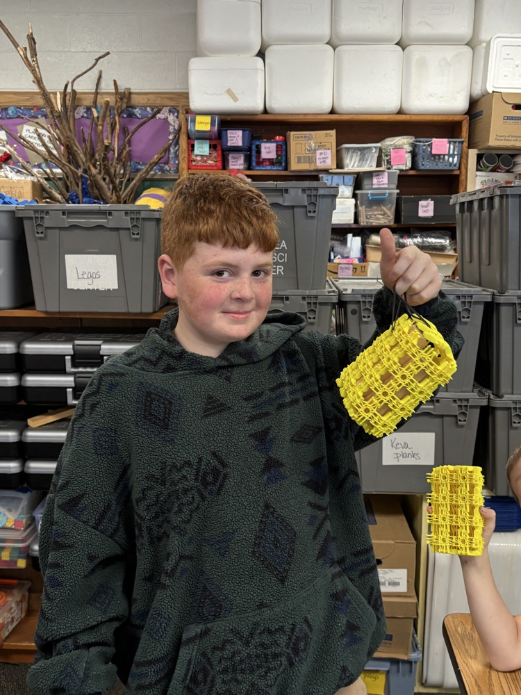 student with box