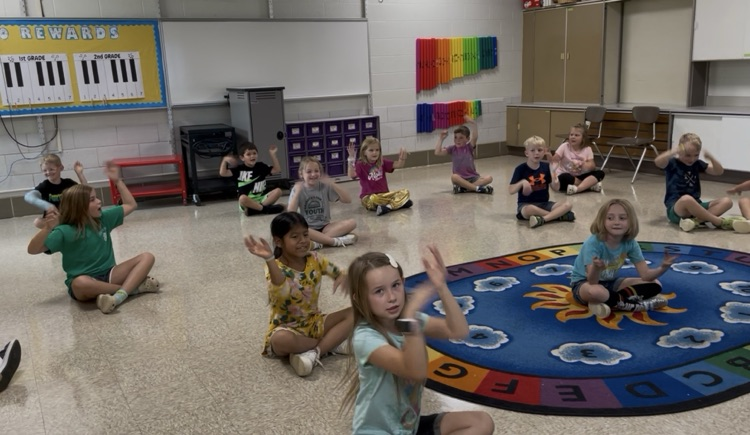 Students singing “Paddle in my Kayak."