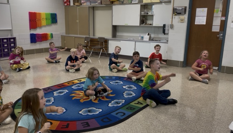 Students singing “Paddle in my Kayak.”