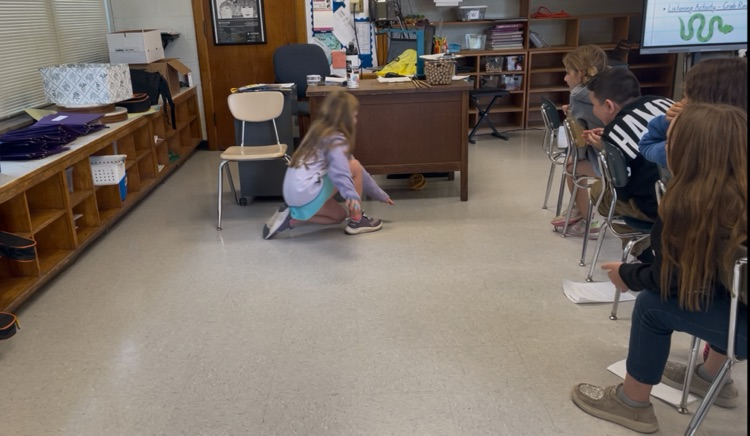 students playing “Black Snake."