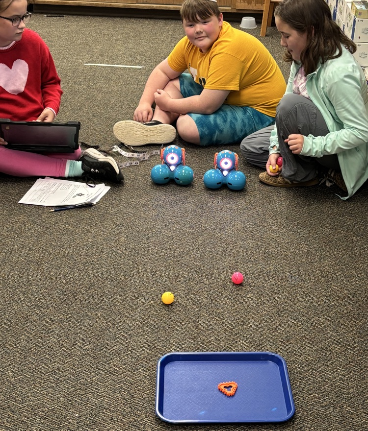 students with dash robots