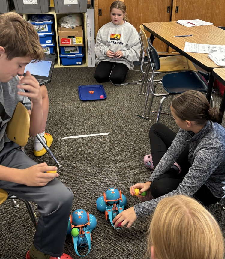 students with dash robots