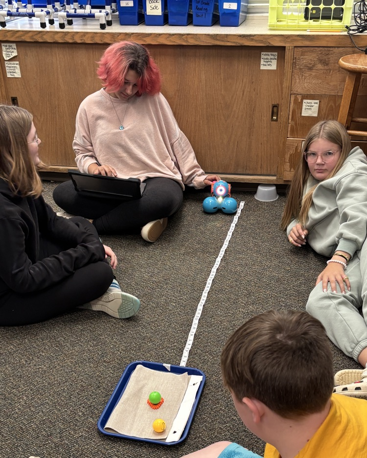 students with dash robots