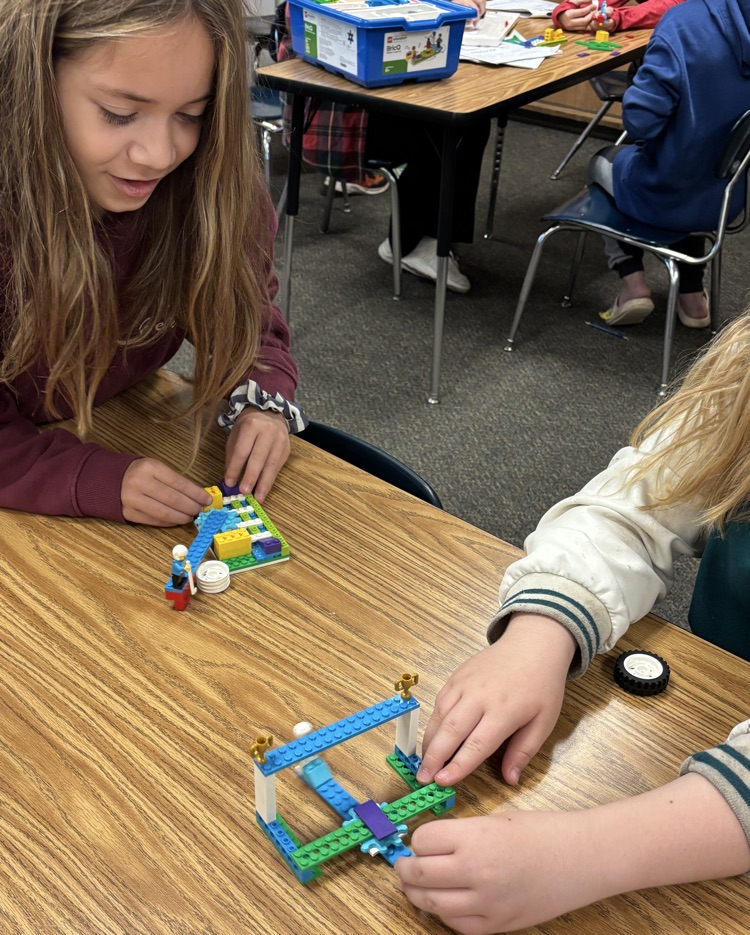 students with hockey game