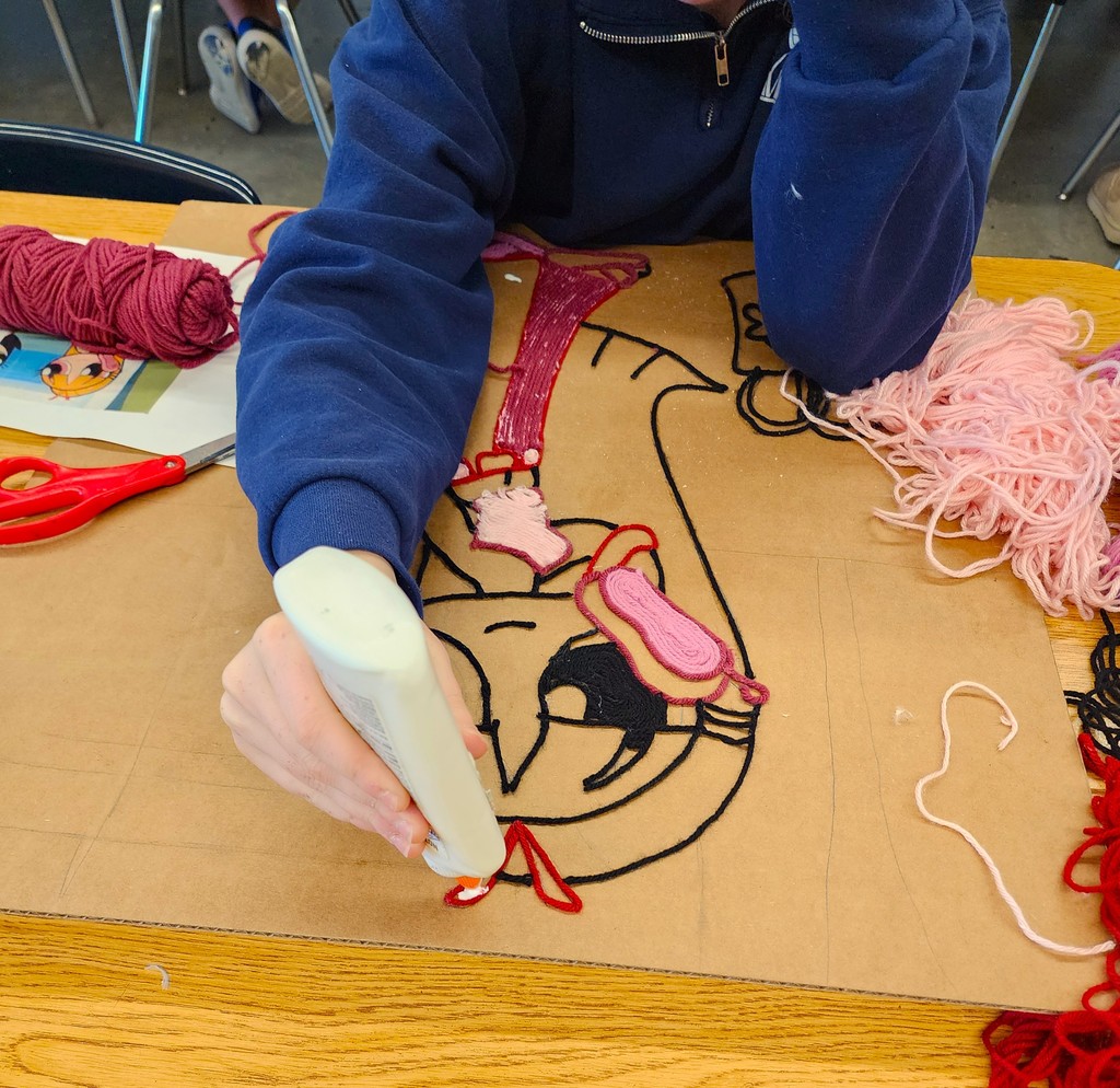 art students using yarn