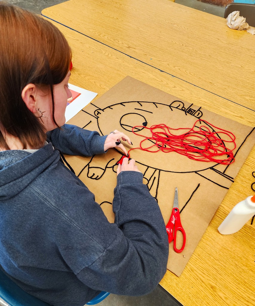 art students using yarn