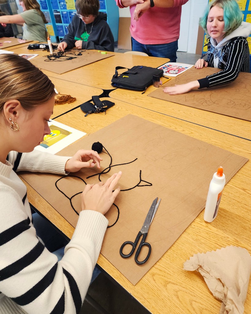art students using yarn
