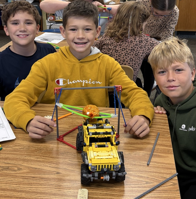 students with pumpkin