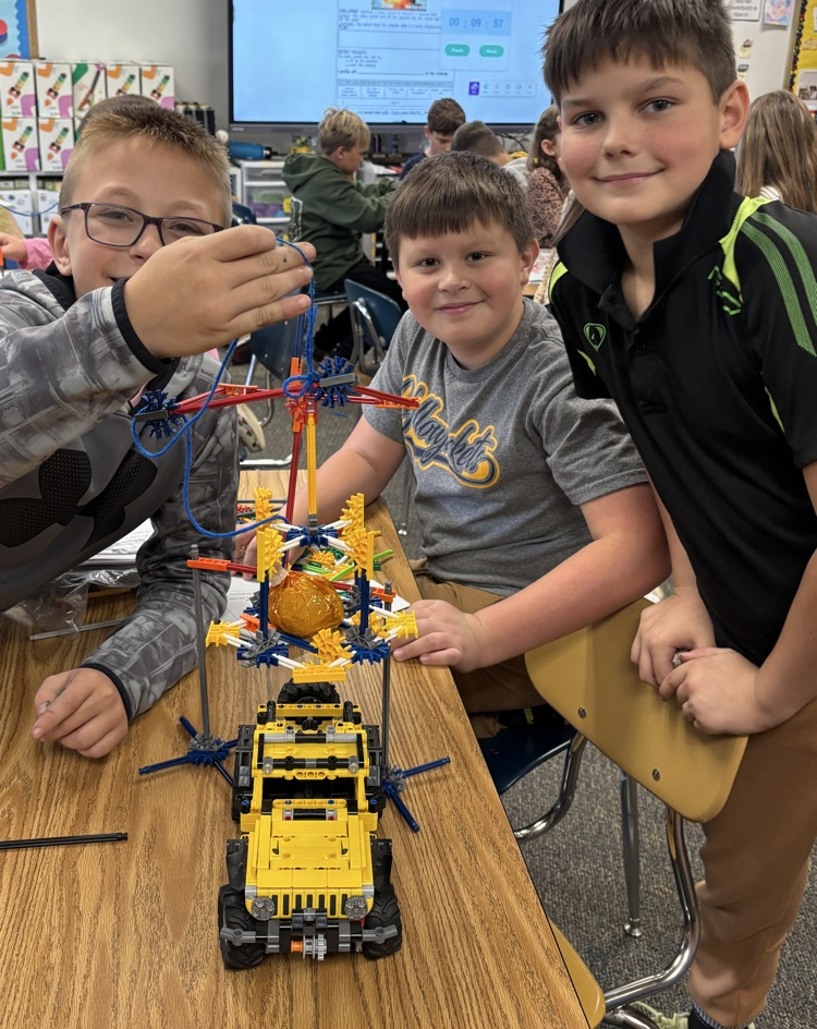 students with pumpkin