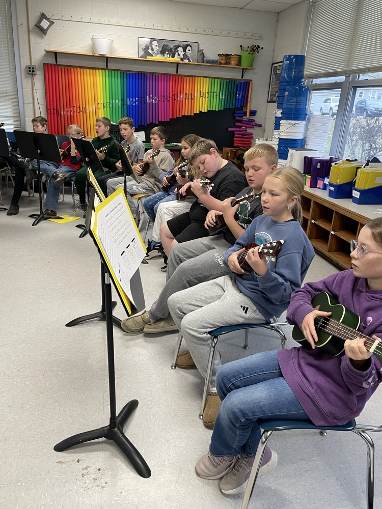 students playing ukulele