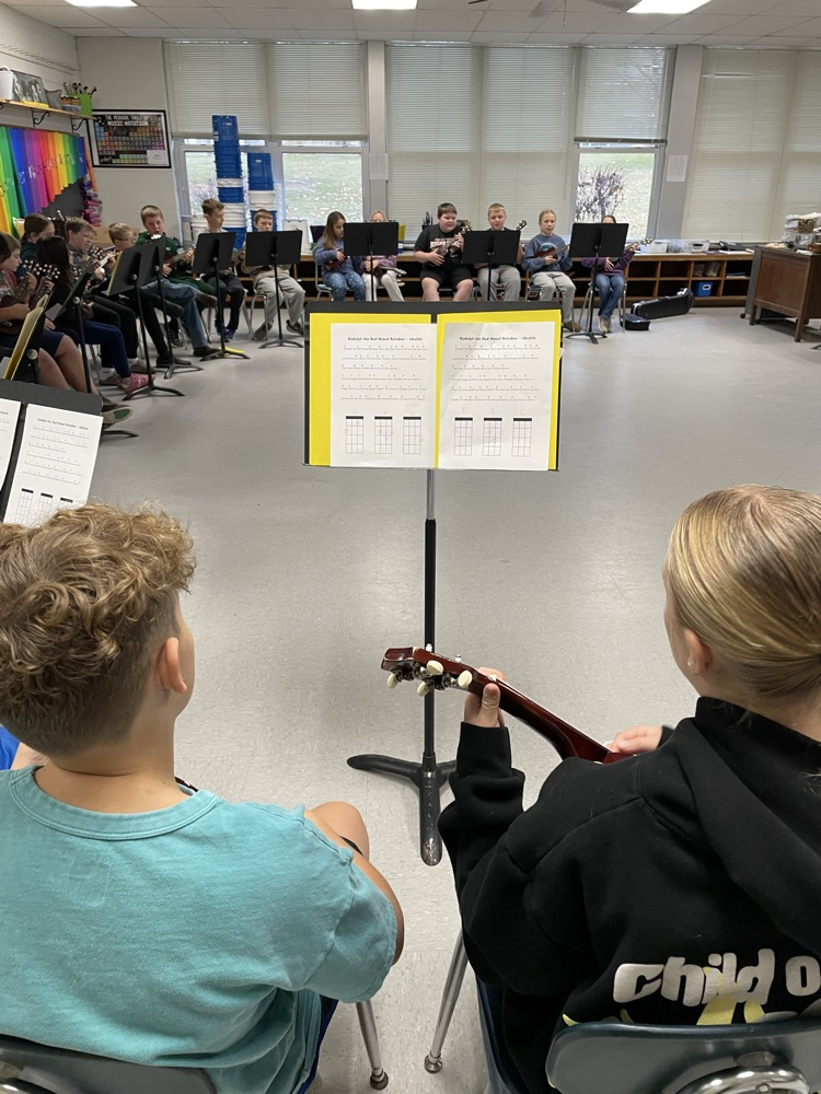 students playing ukulele