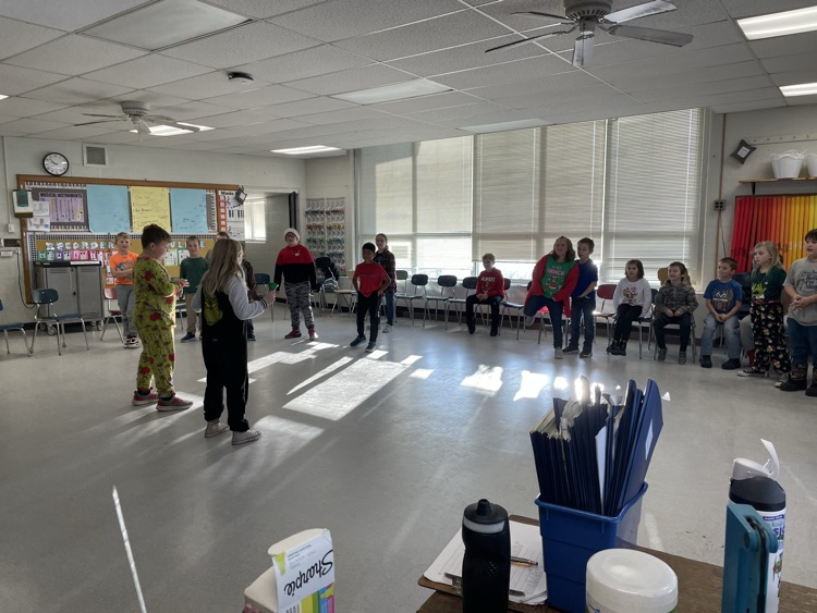students standing in a circle