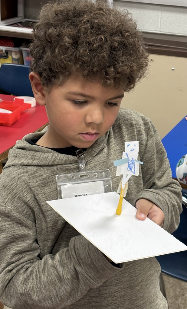 student with magnets 