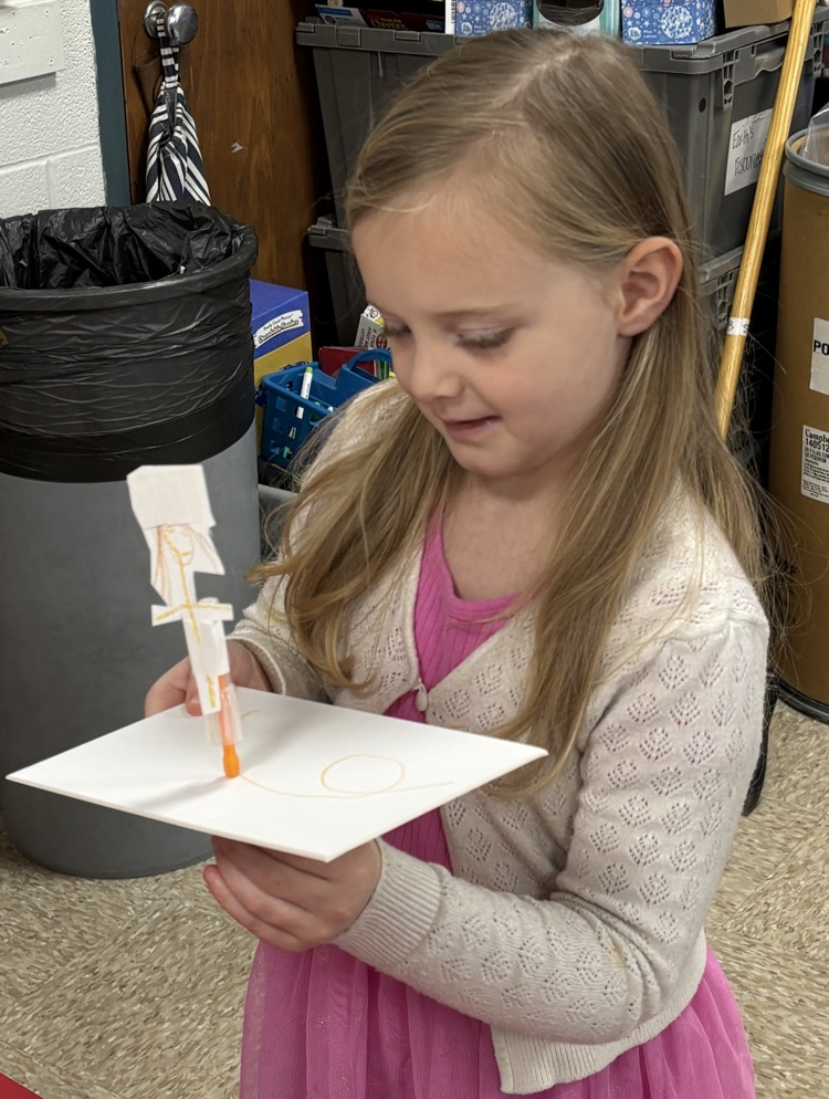 student with magnets