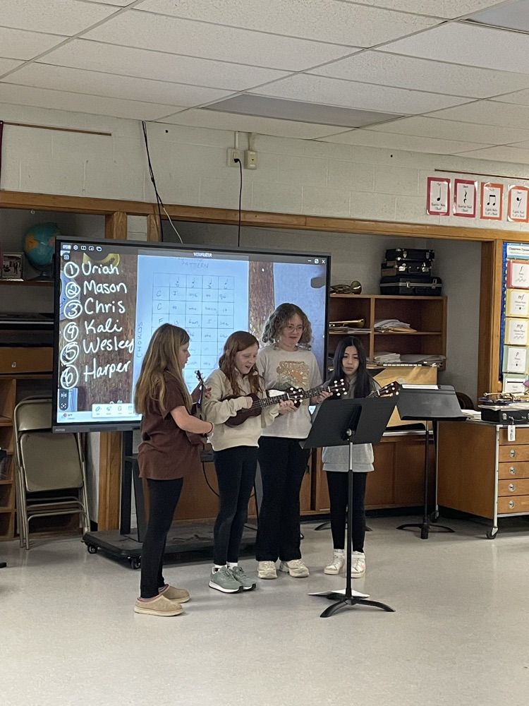 students playing ukulele