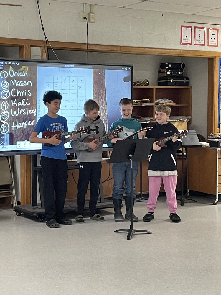 students playing ukulele