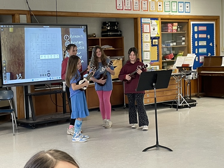 students playing ukulele