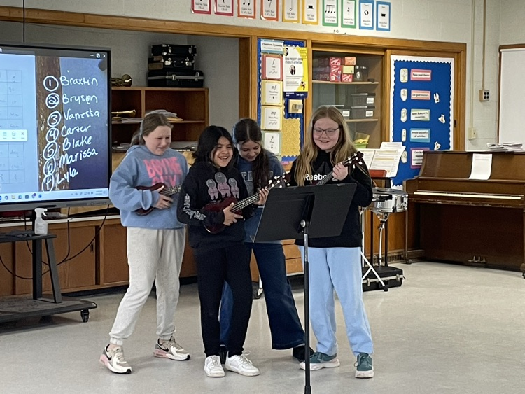 students playing ukulele
