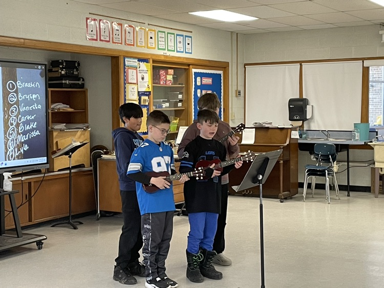 students playing ukulele