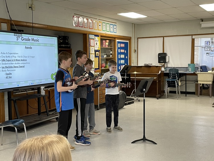 students playing ukulele