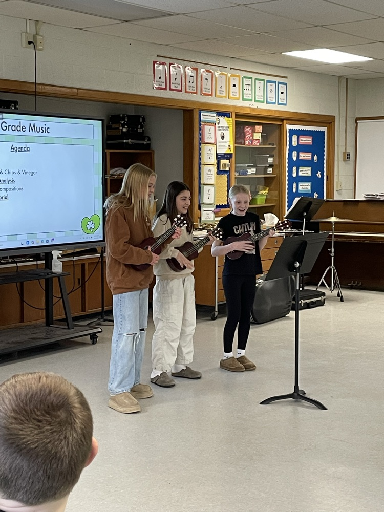students playing ukulele