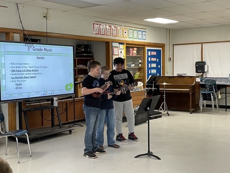 students playing ukulele