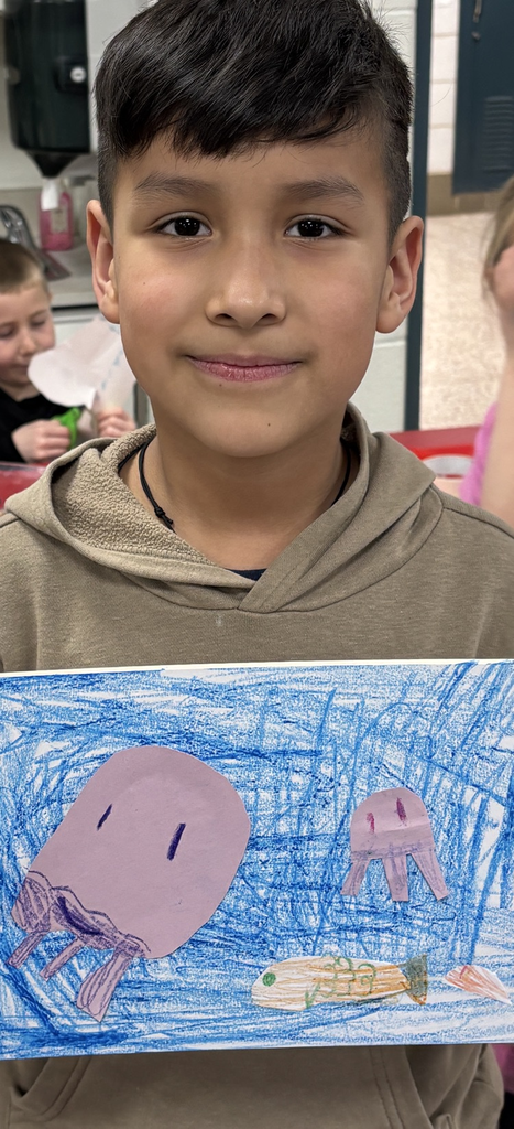 student with ocean picture