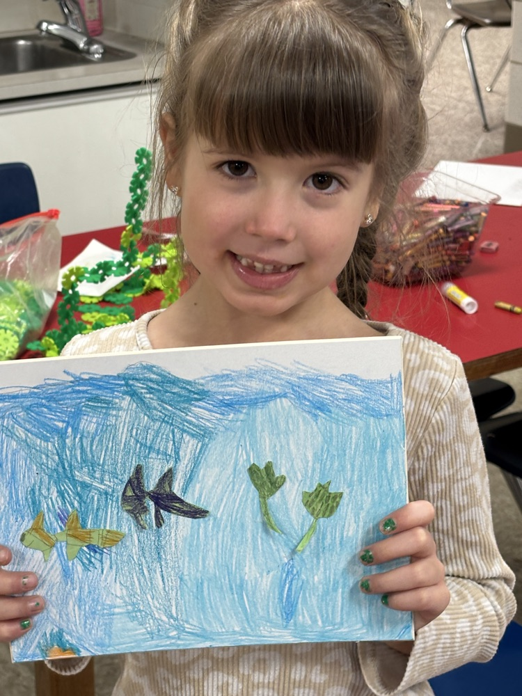 student with ocean picture