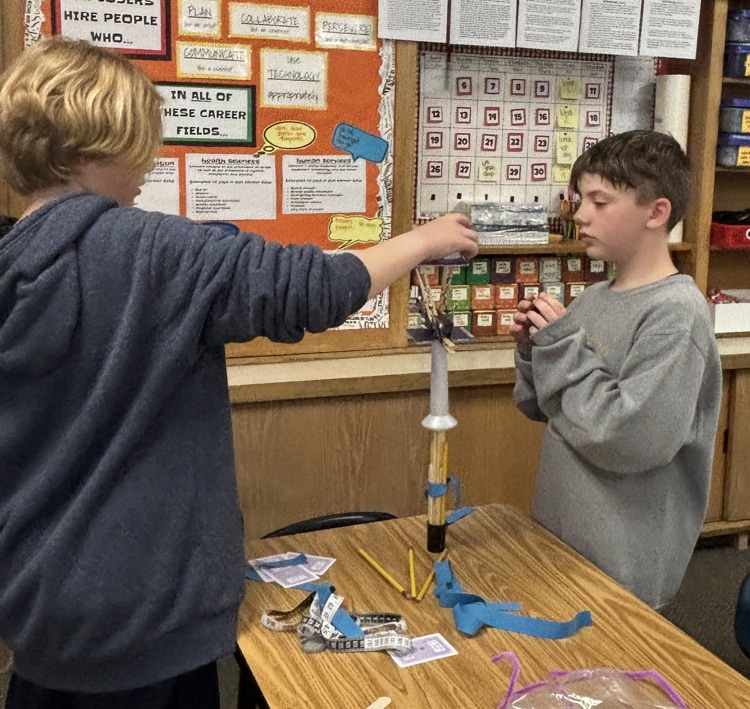students building tower 