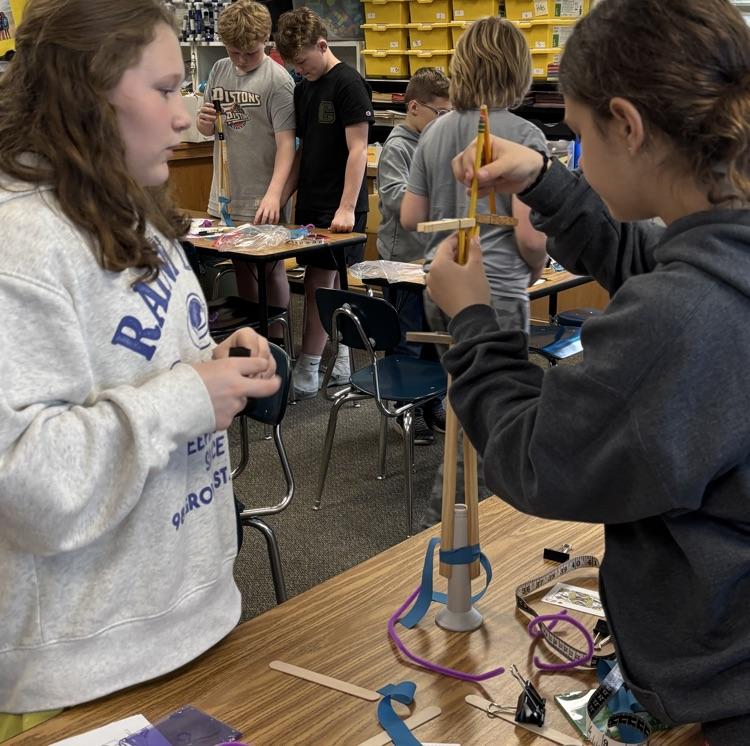 students building tower