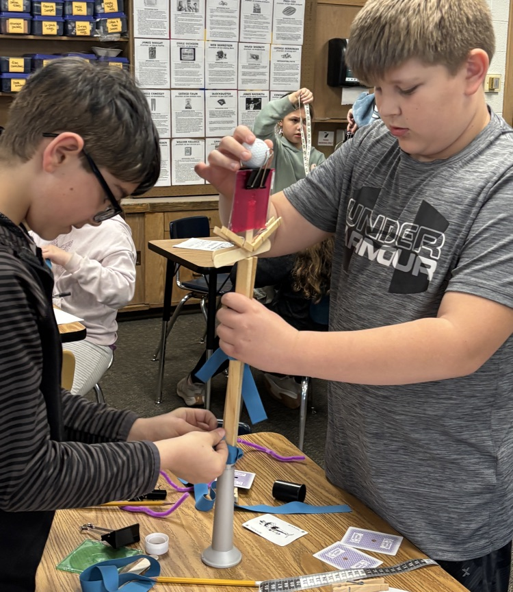 students building tower