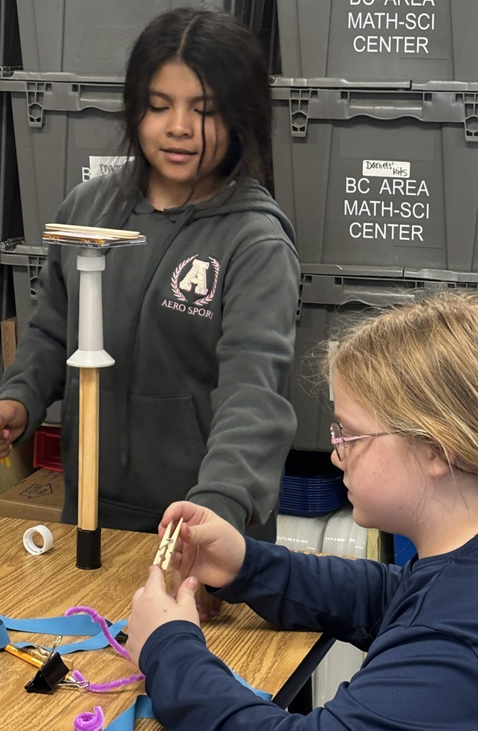 students building tower