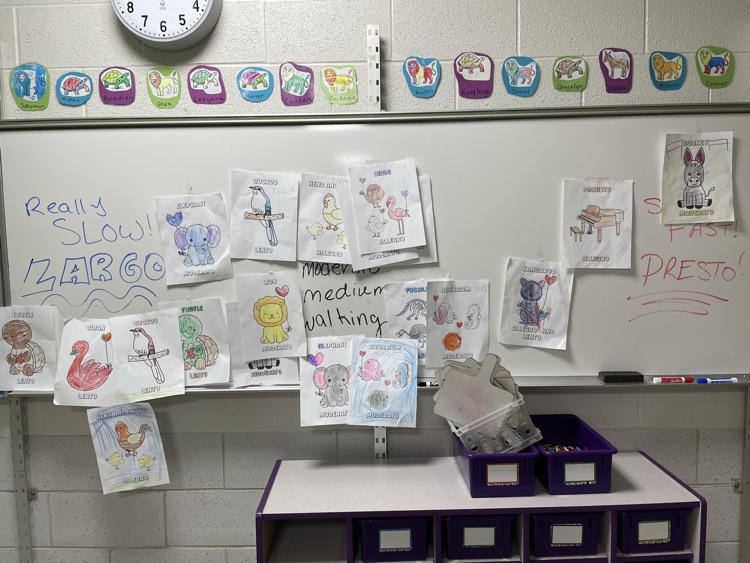pictures of animals on a whiteboard 