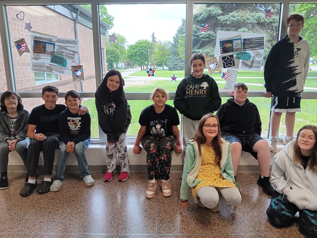 Students creating displays to honor veterans at Memorial Day