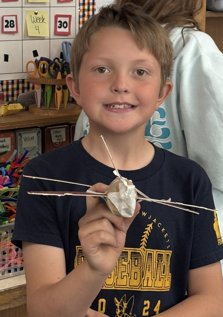 student with plane 