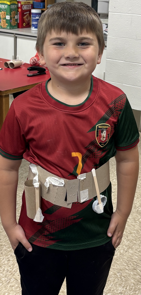 student with tool belt 