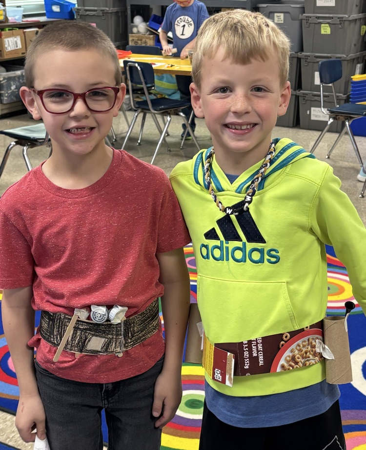 student with tool belt 
