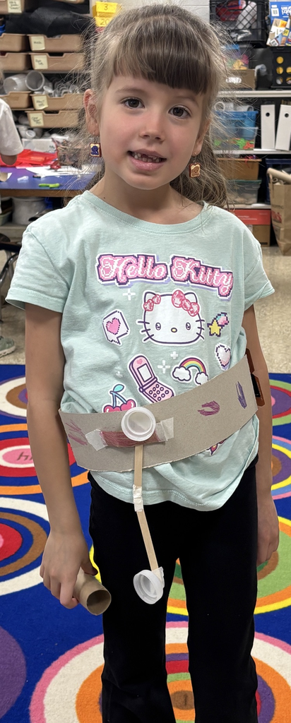 student with tool belt 