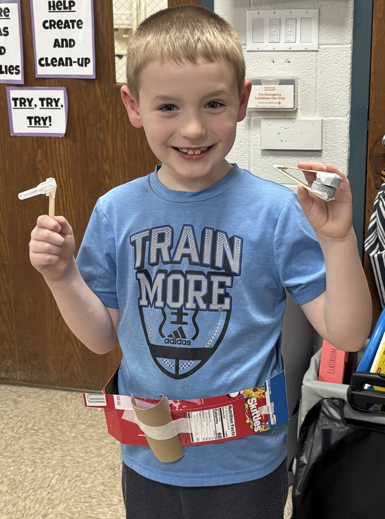 student with tool belt 