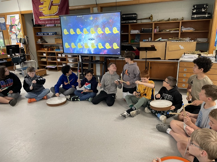 students playing percussion instruments