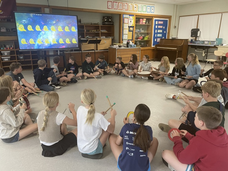 students playing percussion instruments