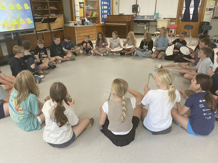 students playing percussion instruments