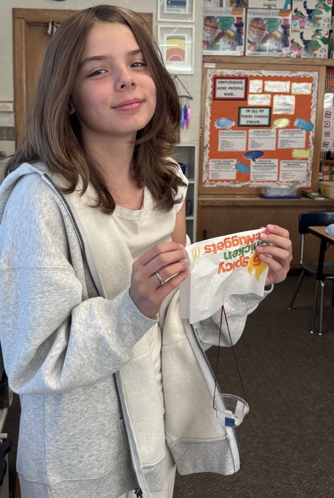 student with parachute 