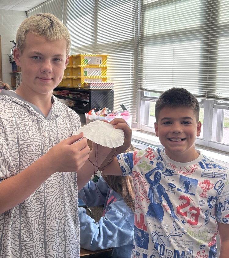 student with parachute 