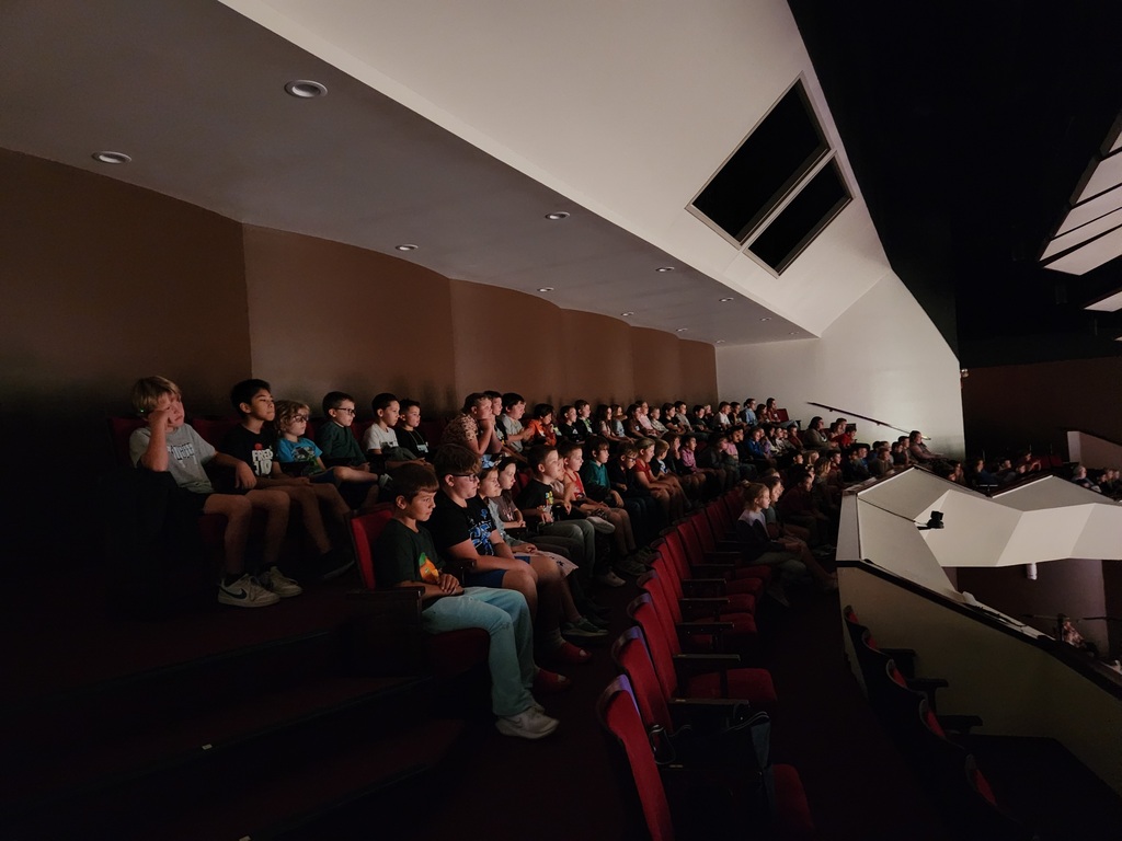 3rd and 4th graders at a dance performance by the Academy of Performing Arts.