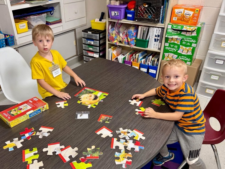 students with puzzle 
