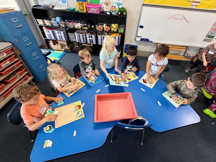 students with puzzles 