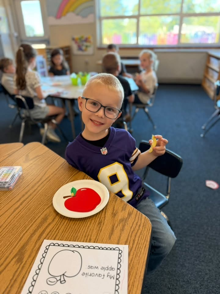 student with apple 