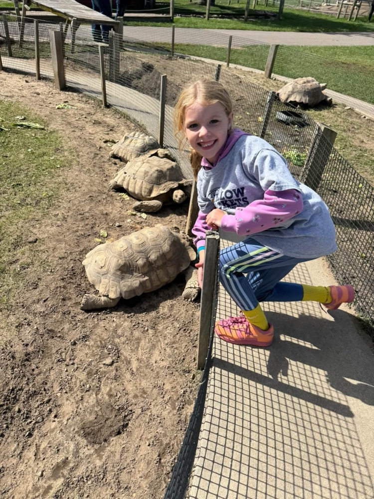student with a tortoise 