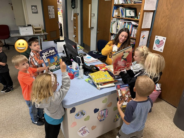 many children with the librarian 